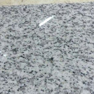 丽江芝麻白光面