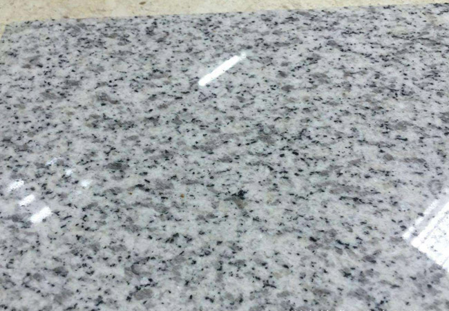 丽江芝麻白光面